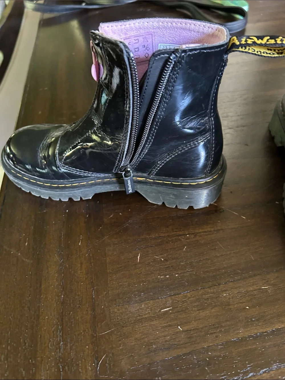 Dr. Martens Kids Black Patent Boots with Pink Trim and Pink Front Zip